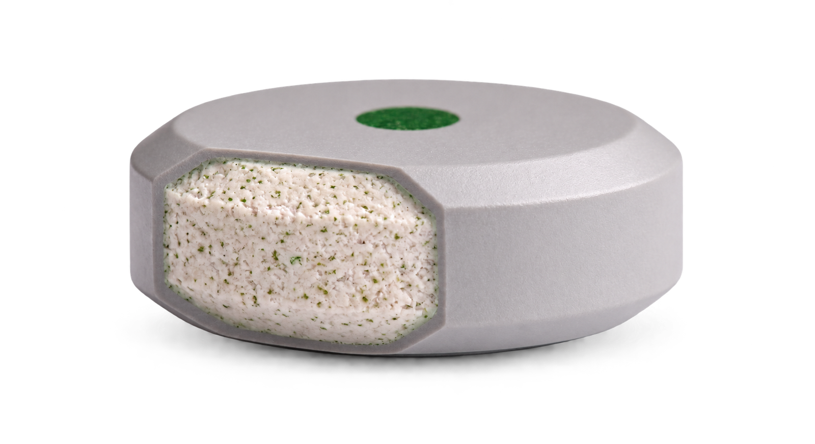 Cutaway tablet showing the nutrient core (1) inside the biodegradable coating (2).